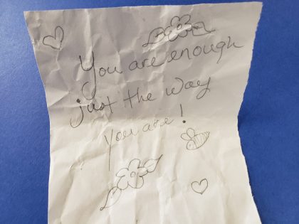 Affirmation paper, with doodles and the words "You are enough just the way you are!"