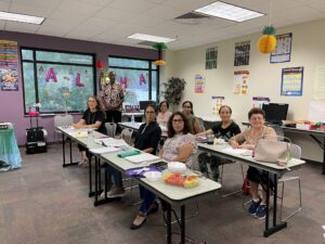 Classroom with students, teacher, ESL-3 class